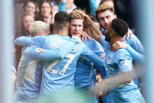 <p>Manchester City midfielder Kevin De Bruyne (centre) scored a stunning winner against Chelsea (Martin Rickett/PA)</p>