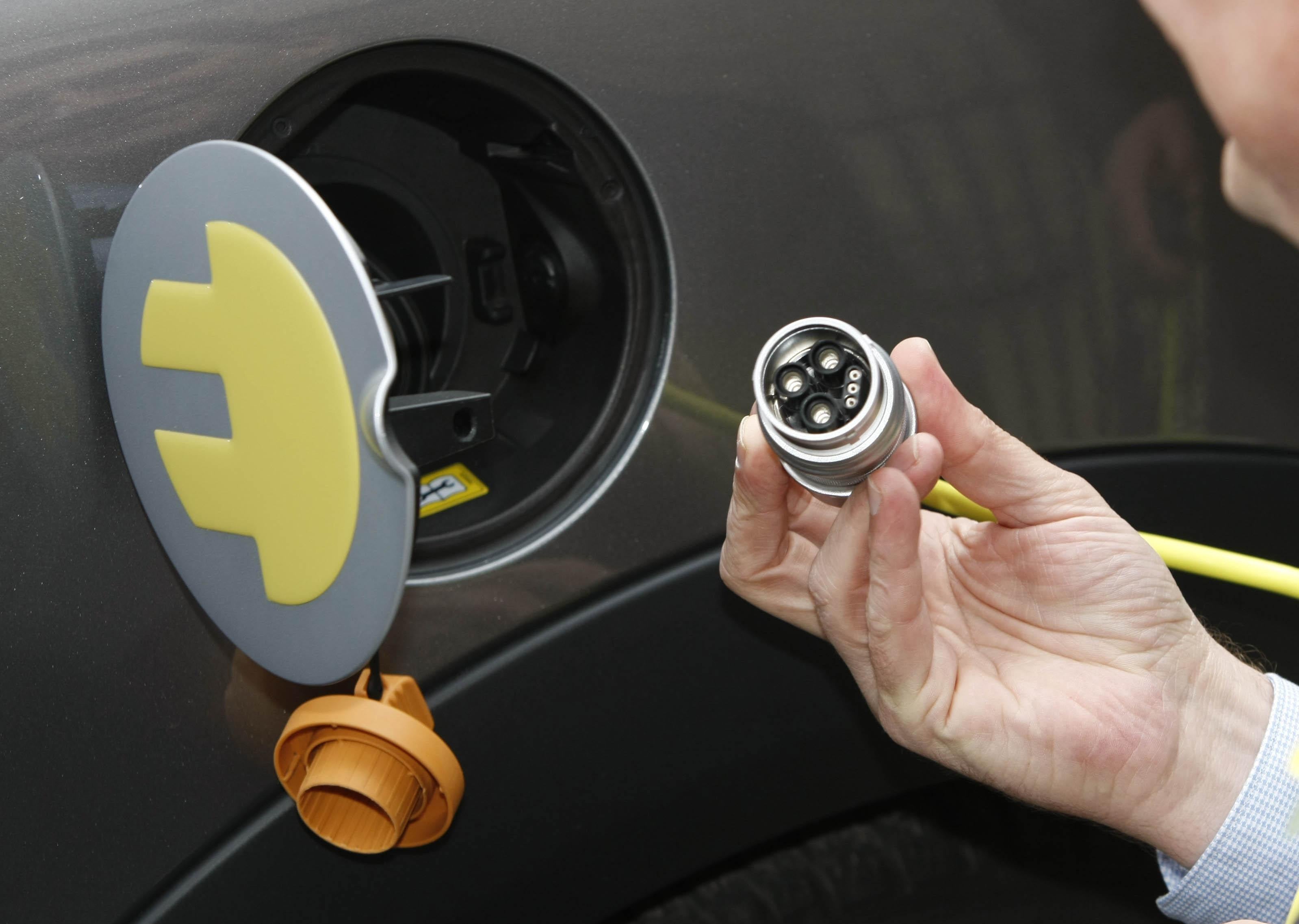 A charging lead for an electric car in Dublin (Niall Carson/PA)