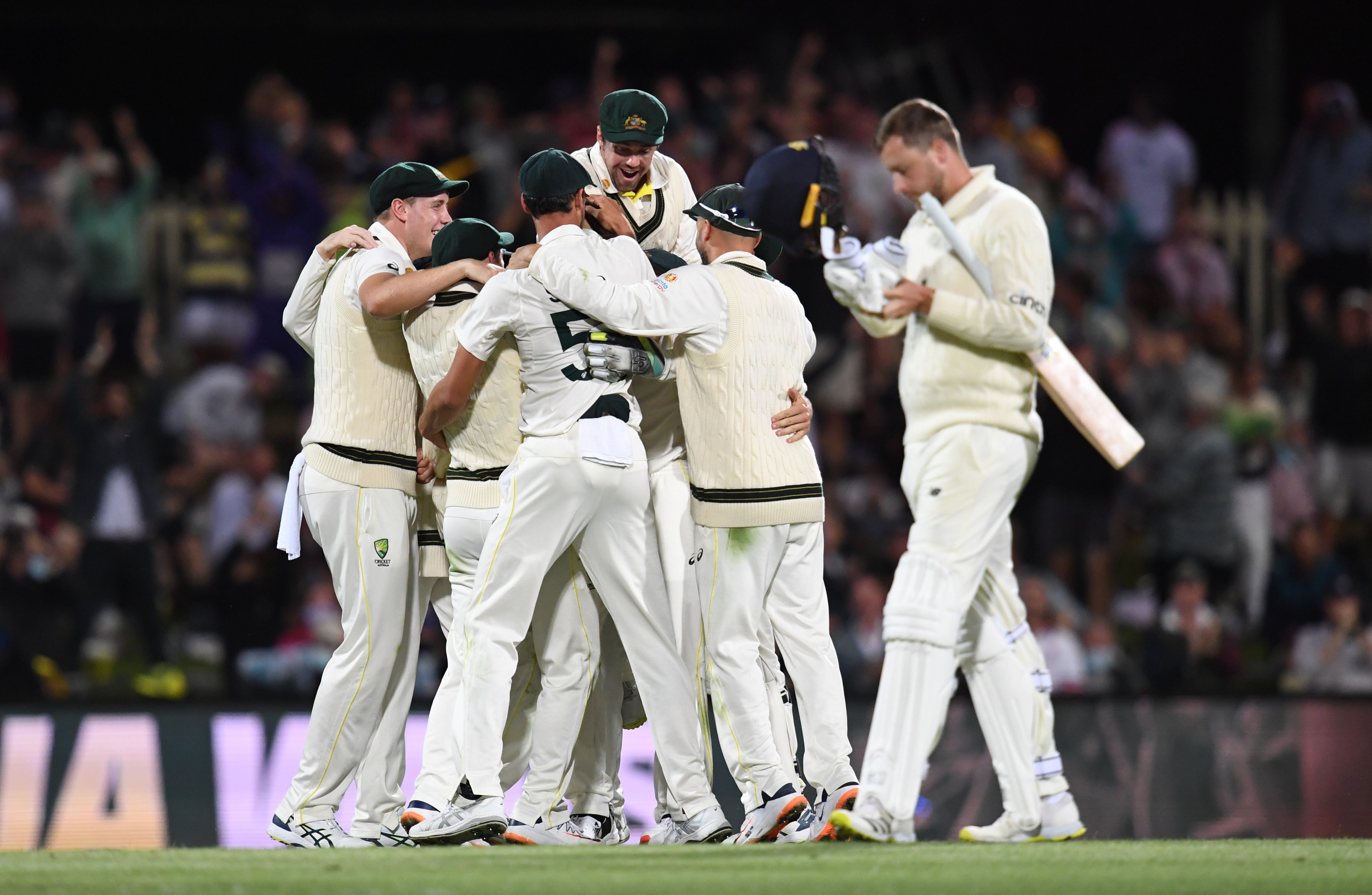 Australia celebrate winning the fifth Ashes Test in Hobart and sealing a 4-0 series win (Darren England via AAP)