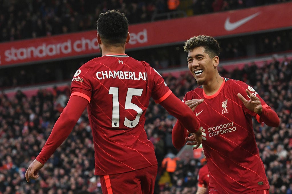 Oxlade-Chamberlain and Firmino celebrate the Reds’ second goal
