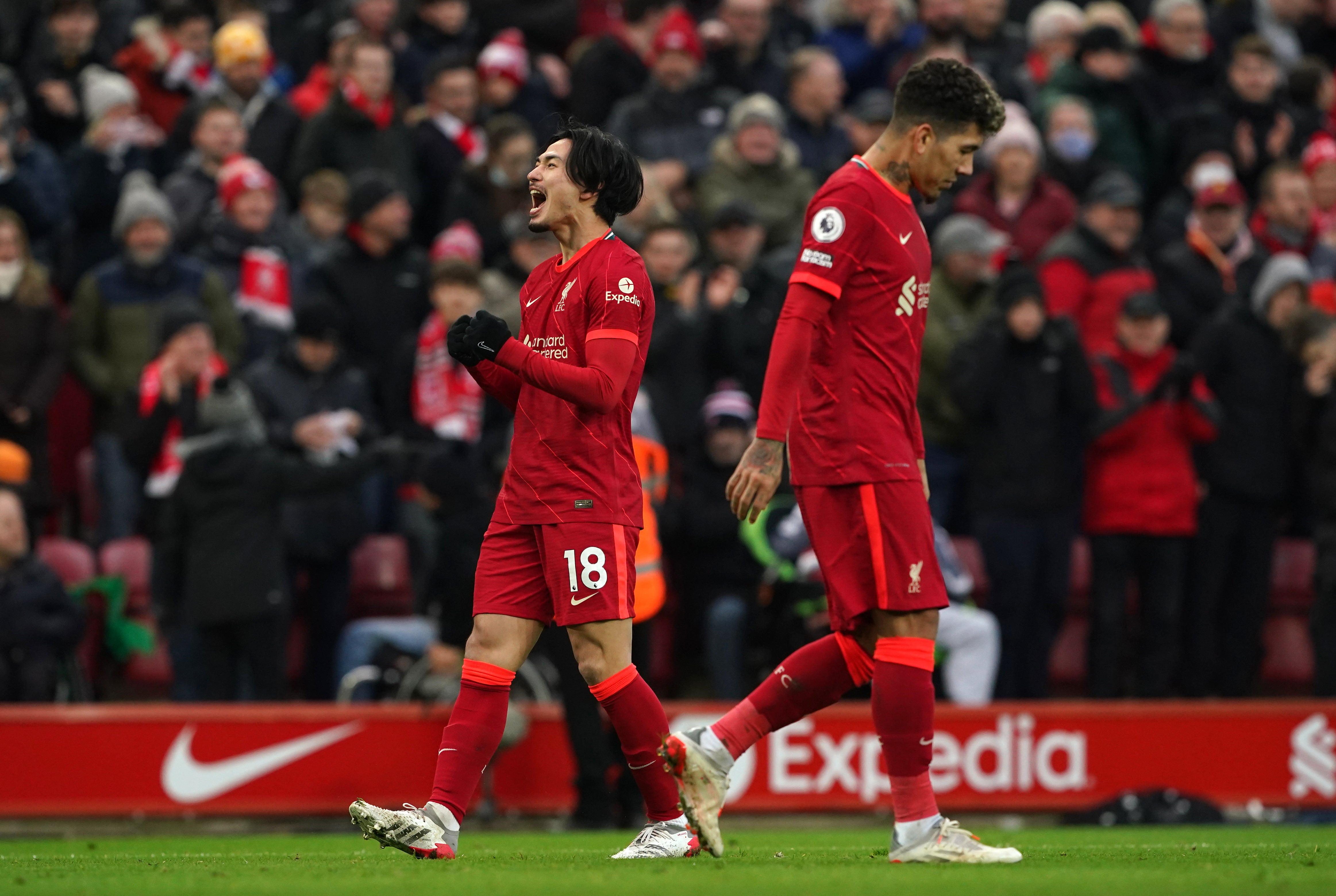 Takumi Minamino (left) scored Liverpool’s third goal on his birthday (Peter Byrne/PA)