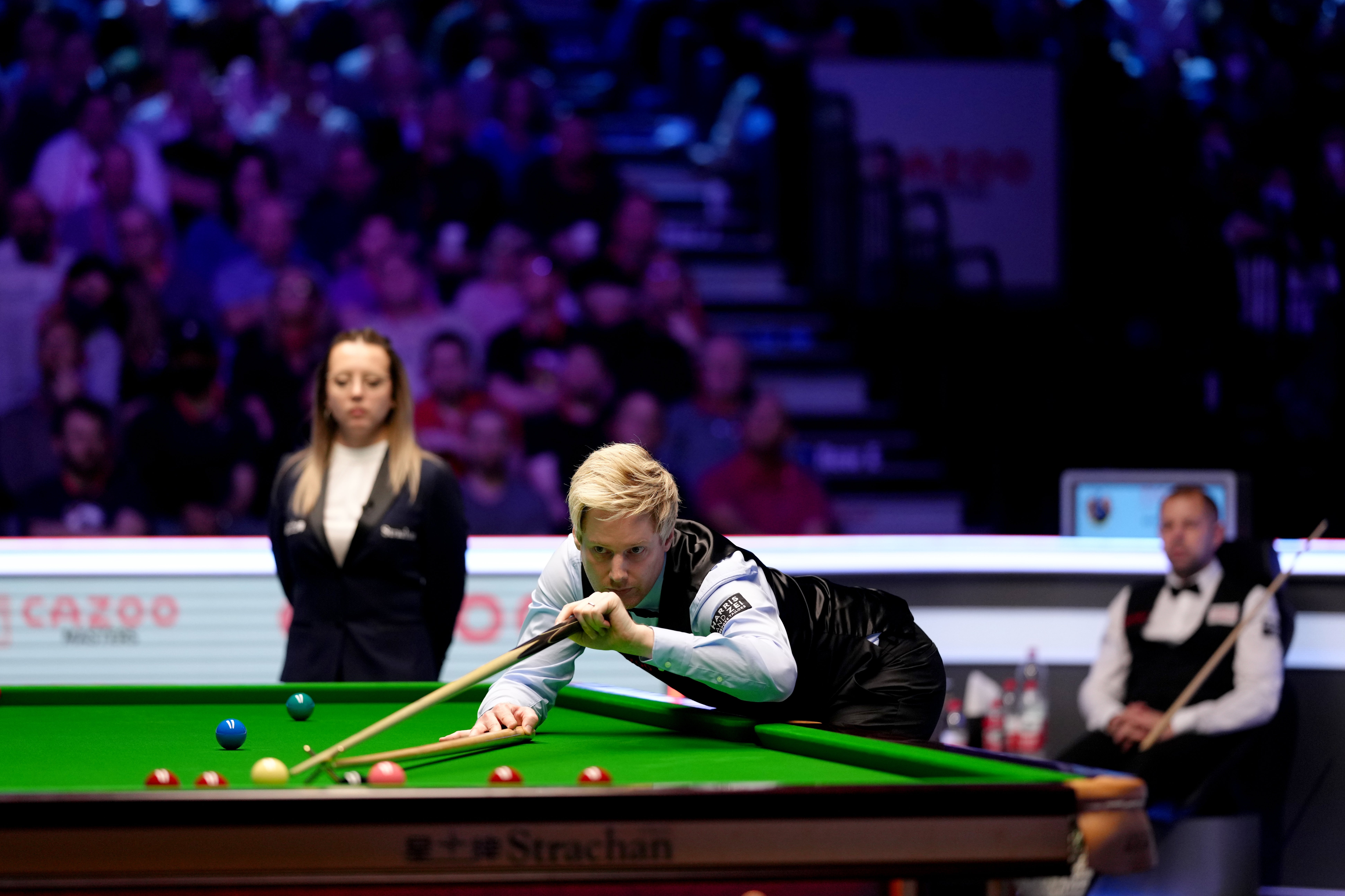 Neil Robertson at the table as opponent Barry Hawkins watches on in their Alexandra Palace final (John Walton/PA)