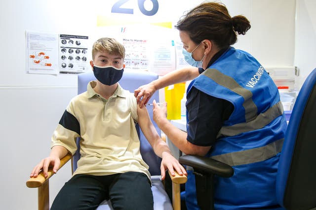 The NHS is rolling out Covid boosters to clinically at-risk 12 to 15-year-olds (Damien Storan/PA)