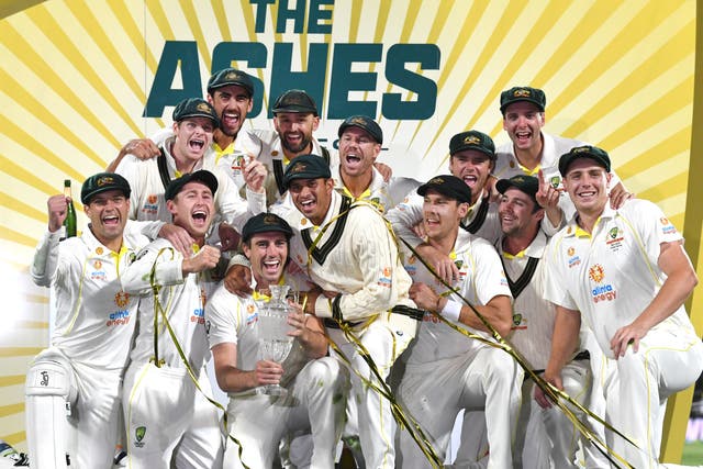 Australia celebrate their 4-0 Ashes series win over England after winning the fifth Test at Hobart (Darren England via AAP)
