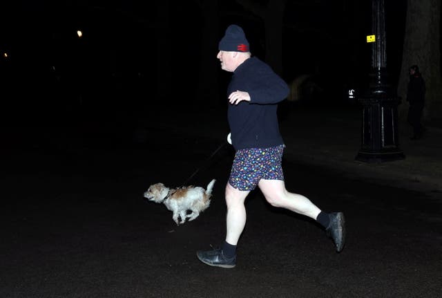 <p>Anything but conservative: Boris Johnson out jogging in eclectic attire</p>
