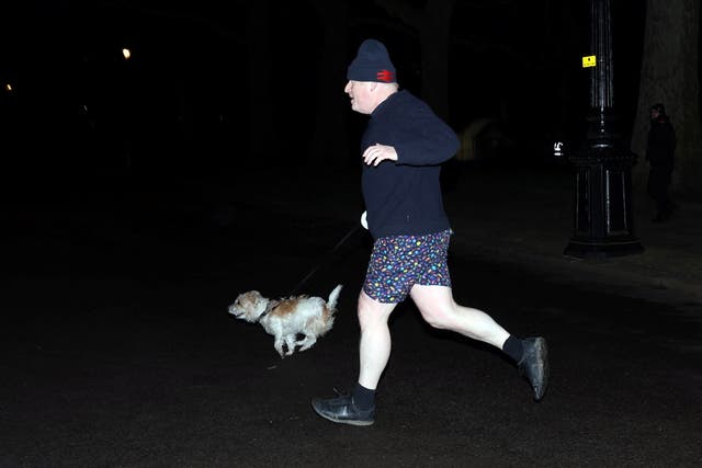 <p>Anything but conservative: Boris Johnson out jogging in eclectic attire</p>