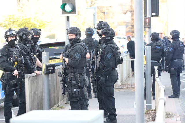 Armed police at Crawley College (Yui Mok/PA)