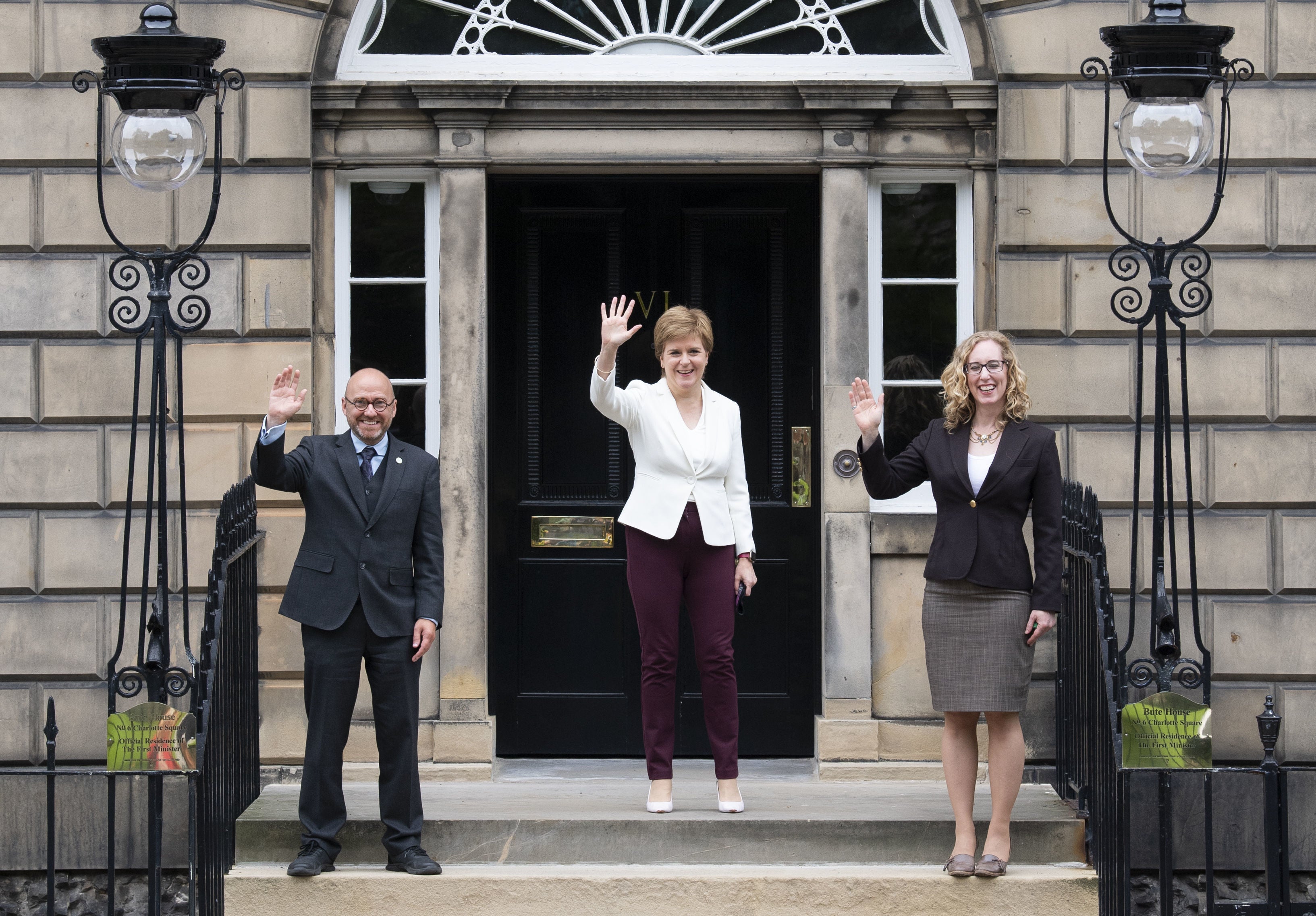Nicola Sturgeon (centre) brought Scottish Green co-leaders Patrick Harvie (left) and Lorna Slater (right) into Government after signing a cooperation agreement with their party. (Lesley Martin/PA)