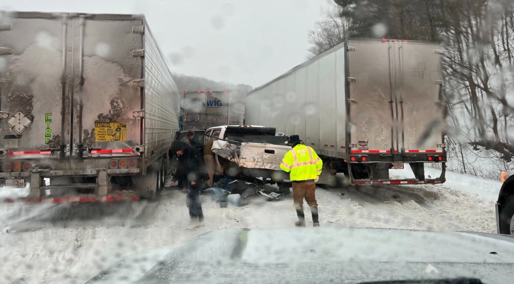 Troopers responding to a crash involving four tractor-trailers and a pickup truck in Montgomery County on Sunday