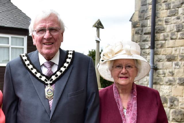 Freda Walker, 86, who was killed on Saturday, and her husband, Ken, a former district councillor who is in a critical condition in hospital (Bolsover District Council/PA)