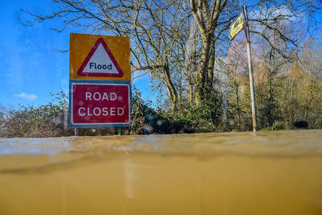 Flooding is among the costly threats facing the UK (Ben Birchall/PA)