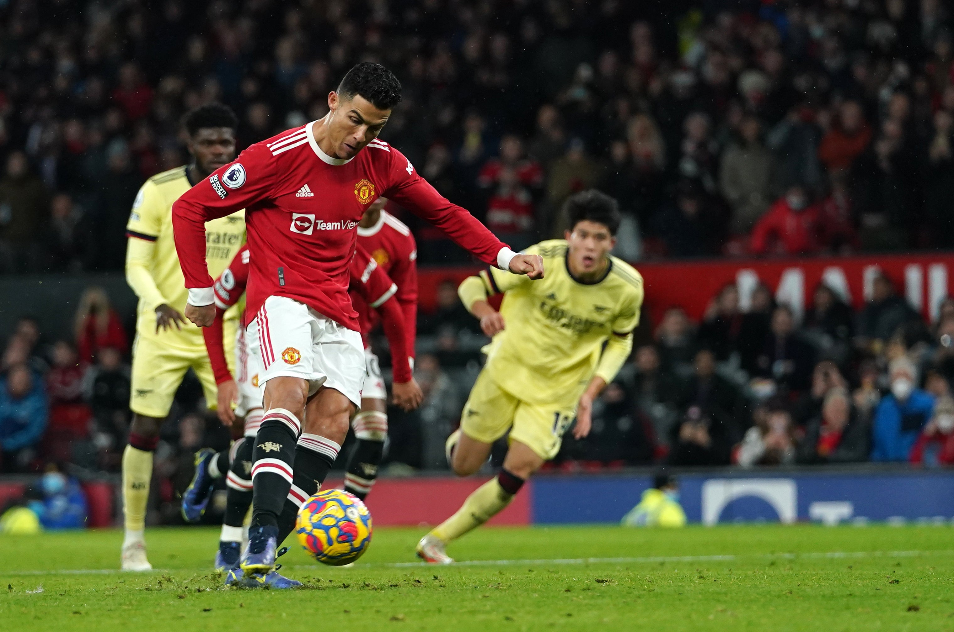 Cristiano Ronaldo scores a Manchester United penalty against Arsenal (Martin Rickett/PA)
