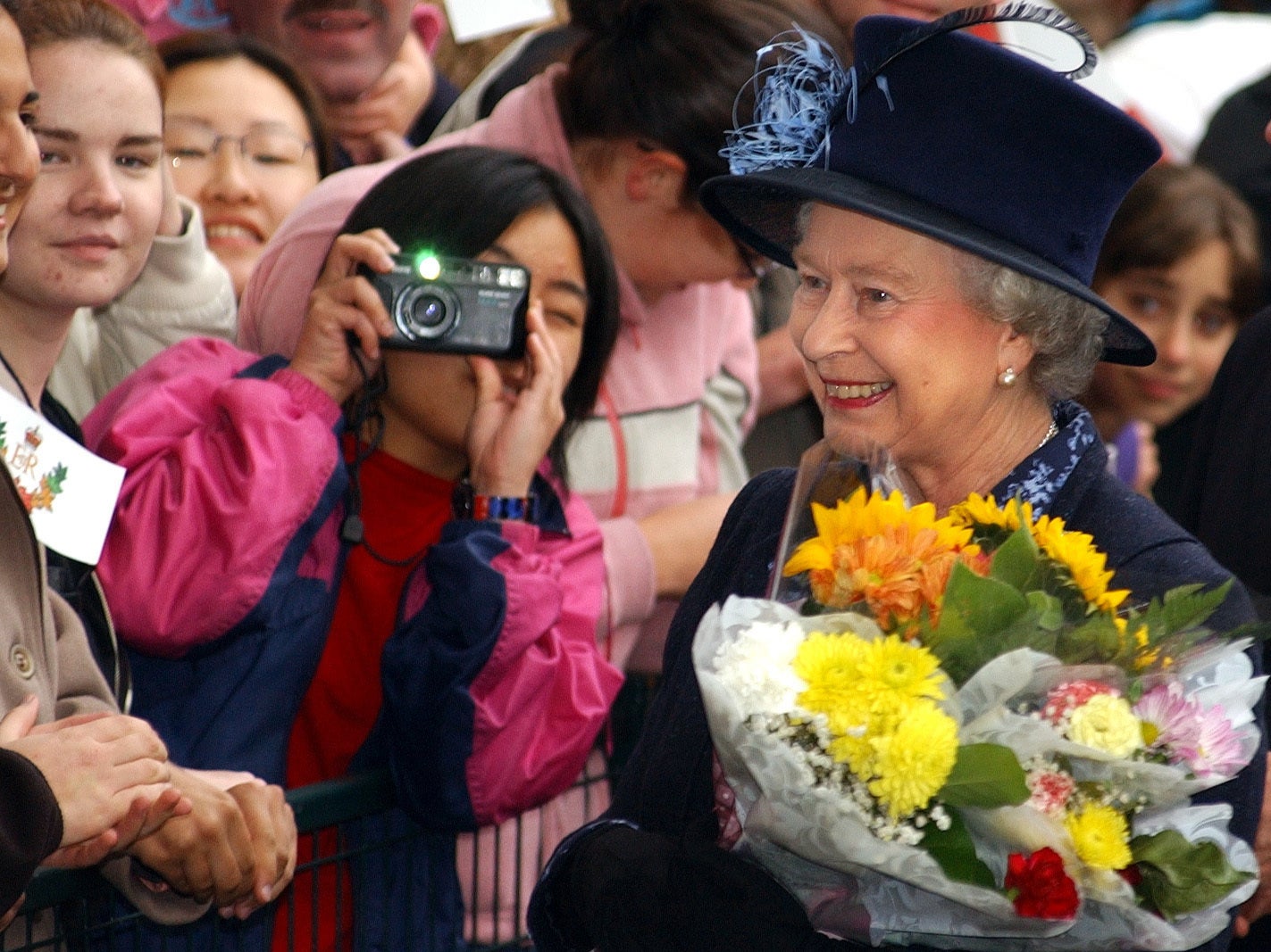 Queen Elizabeth II meeting wellwishers during a walkabout at the University of British Columbia in Canada in 2002