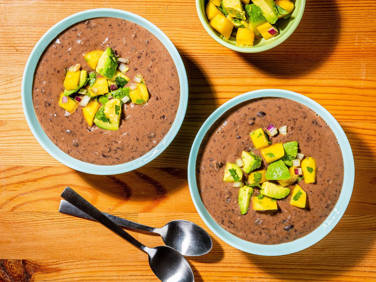 Creamy, bright and satisfying coconut black bean soup with mango-avocado salsa