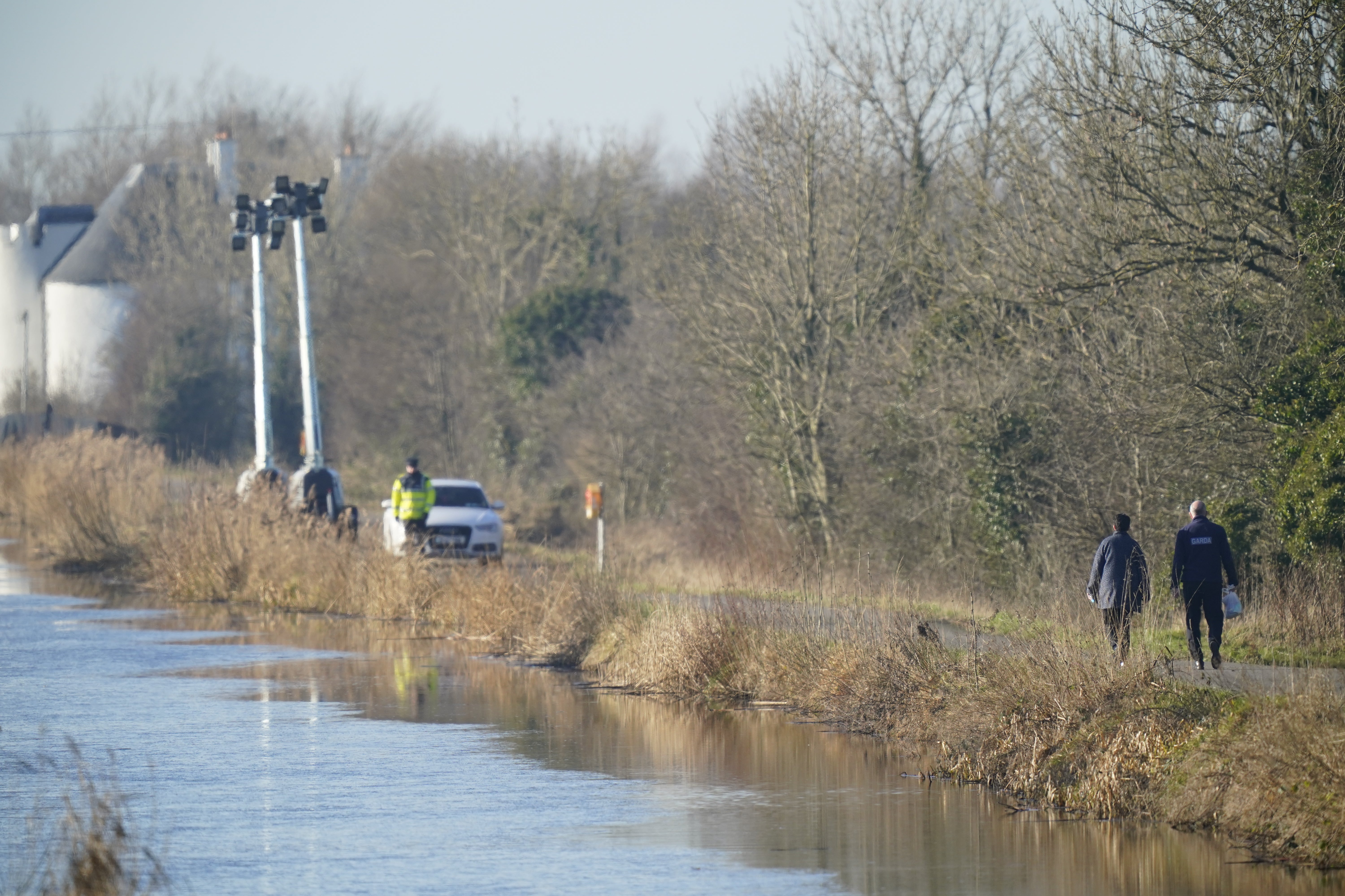 Gardai beside the Grand Canal in Tullamore, Co Offaly, where primary school teacher Ashling Murphy was found dead after going for a run on Wednesday afternoon (Niall Carson/PA)