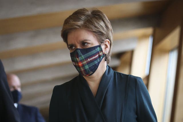 Scotland’s First Minister Nicola Sturgeon, arrives for First Minster’s Questions at the Scottish Parliament in Holyrood, Edinburgh. Picture date: Thursday January 13, 2022.