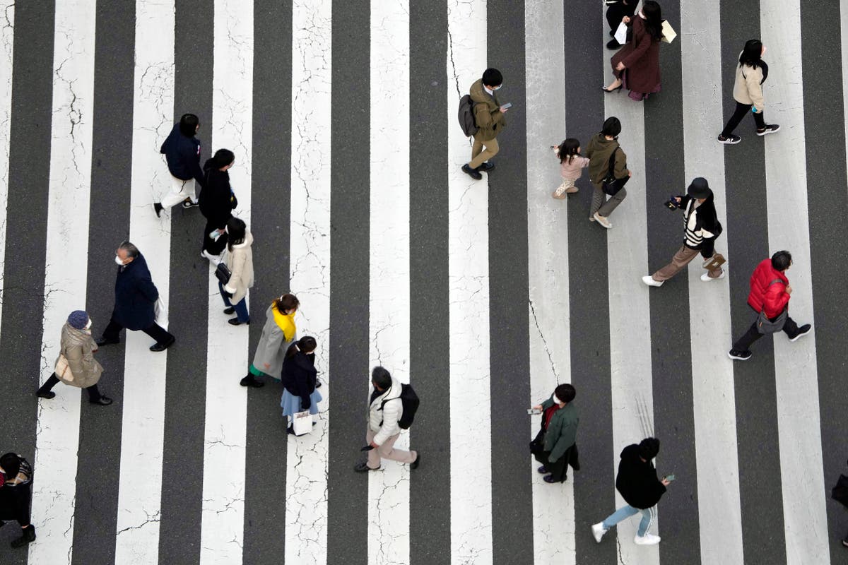 Japan ready to expand COVID restrictions as infections surge The