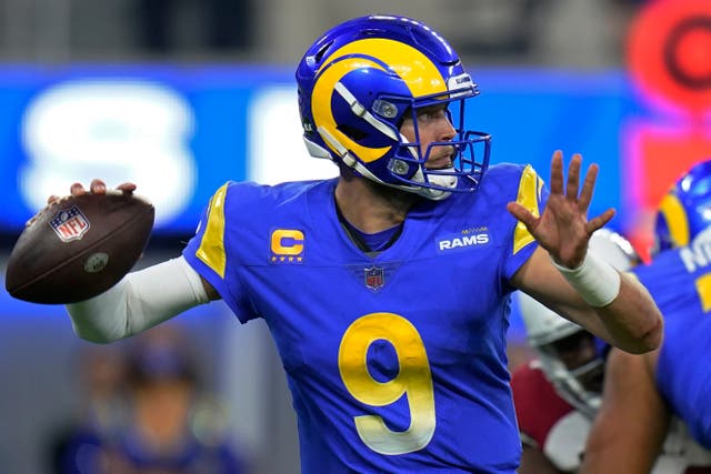 Los Angeles Rams quarterback Matthew Stafford (9) passes against the Arizona Cardinals during the second half of an NFL wild-card playoff football game in Inglewood, Calif., Monday, Jan. 17, 2022. (AP Photo/Jae C. Hong)