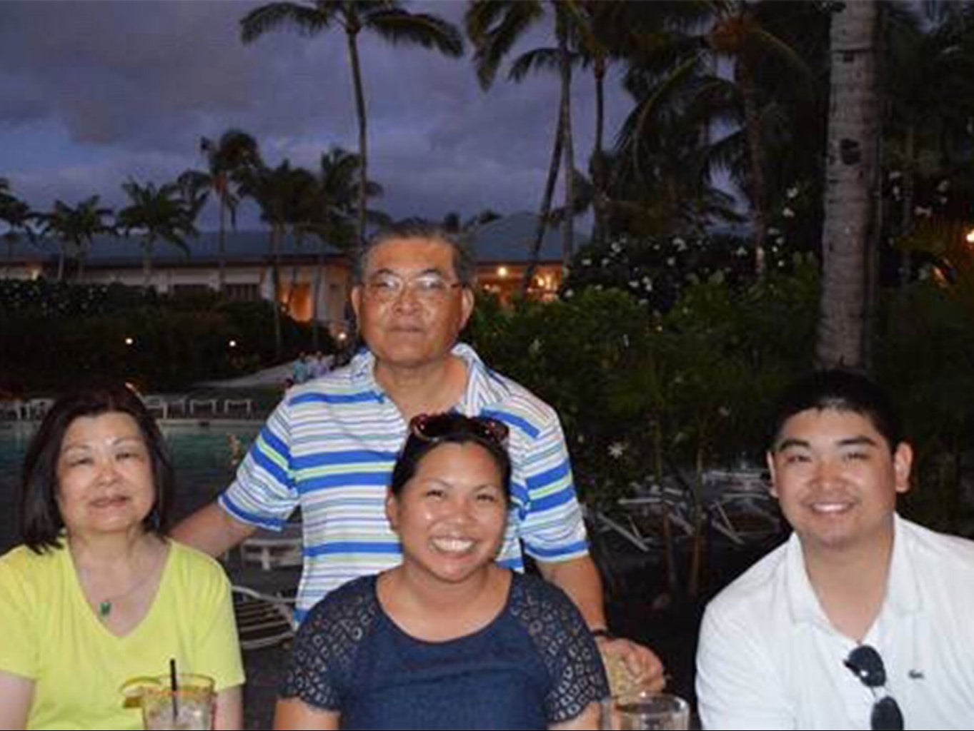 Michelle Go is pictured with her family before her death on Saturday