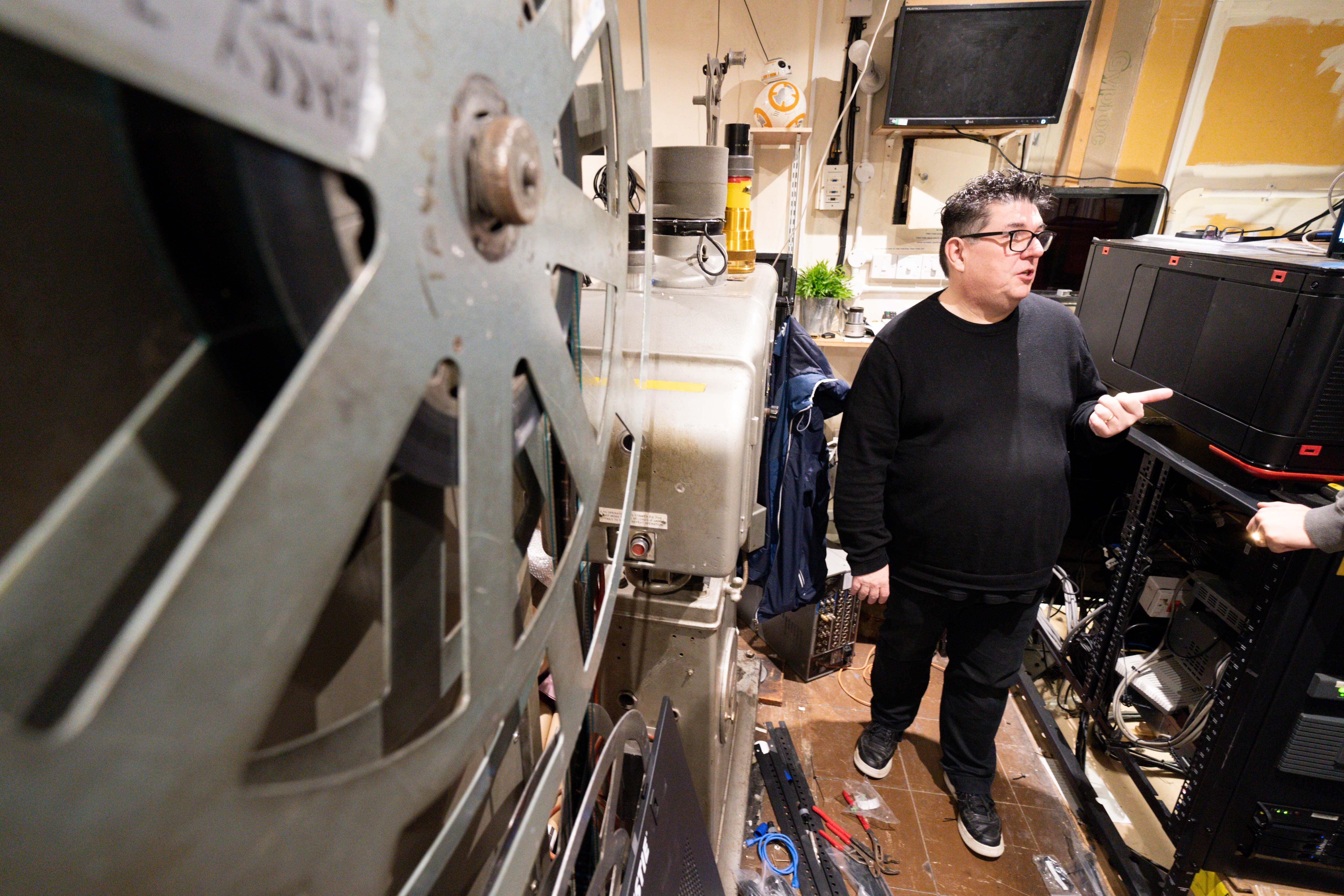 The cinema’s owner, Kevin Markwick, in the projector room (Jacob King/PA)