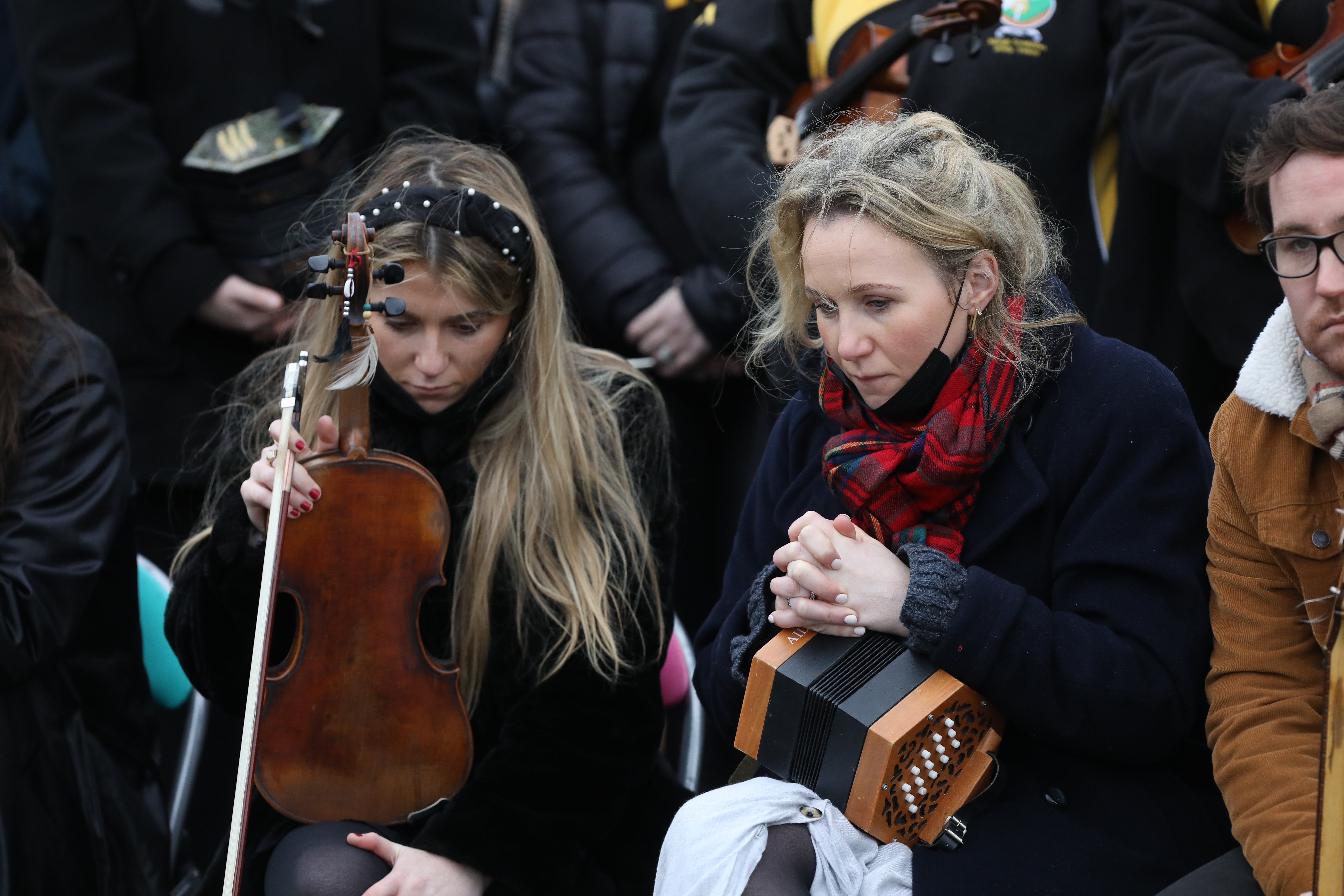 Traditional Irish musicians play outside St Brigid’s Church, Mountbolus, Co Offaly, at Ashling Murphy’s funeral (Damien Eagers/PA)