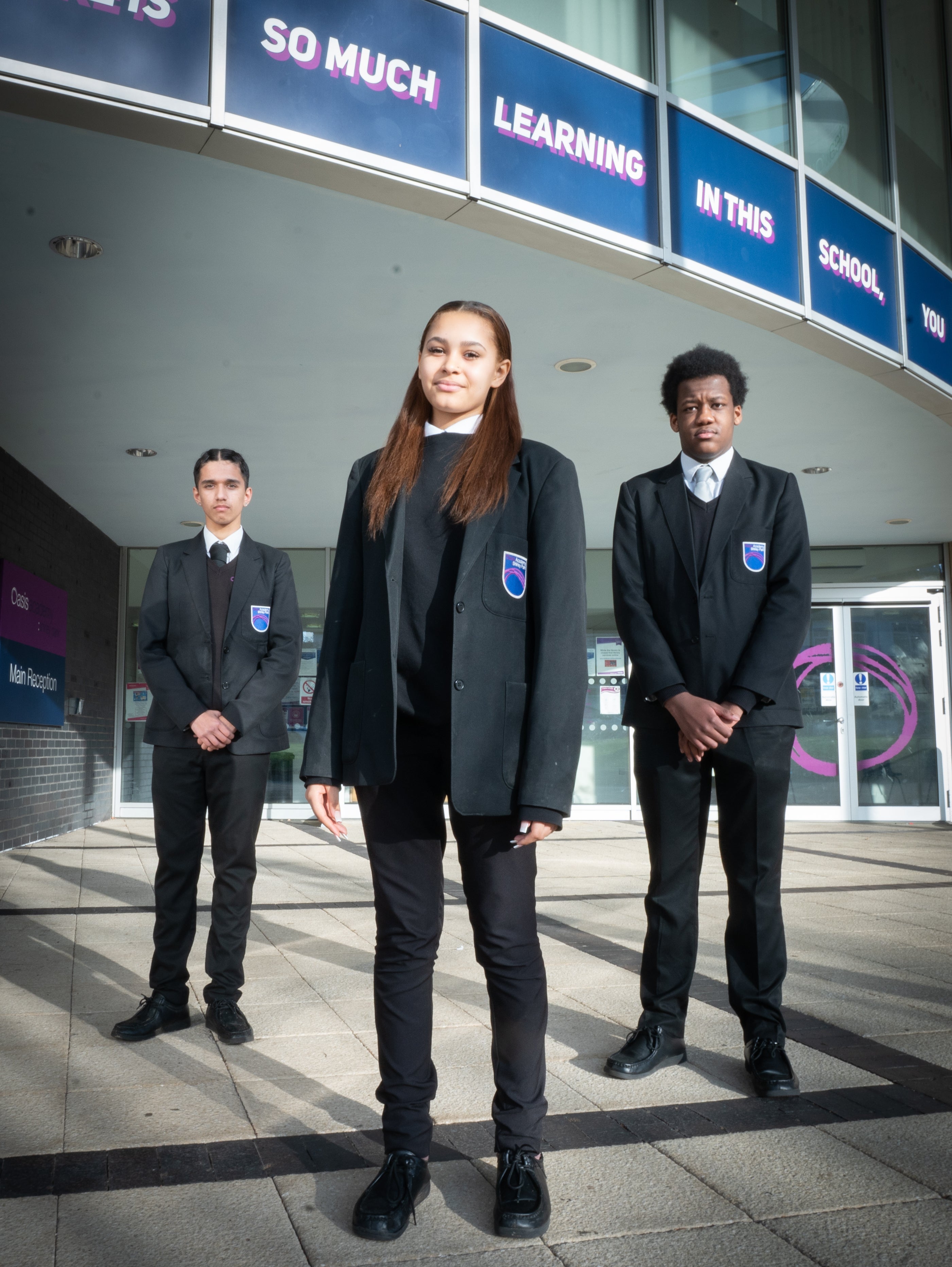 Pupils (left to right) Aakash Khanal, Saffron Ramwalden and Jacob Akiobe-Peters are on the fundraising committee for the new youth centre (Stefan Rousseau/PA)