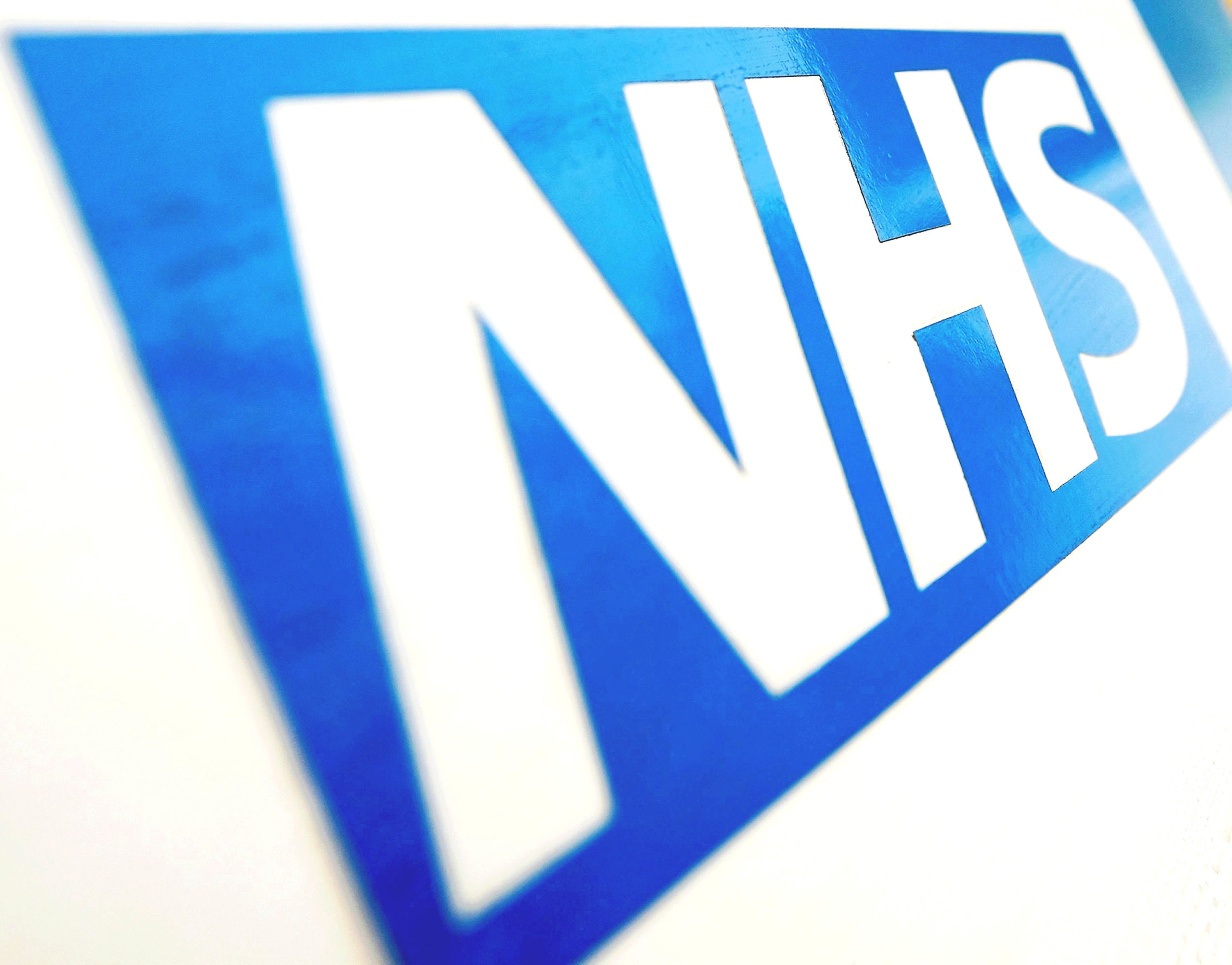 File photo dated 16/11/21 of the NHS logo (Dominic Lipinski/PA)