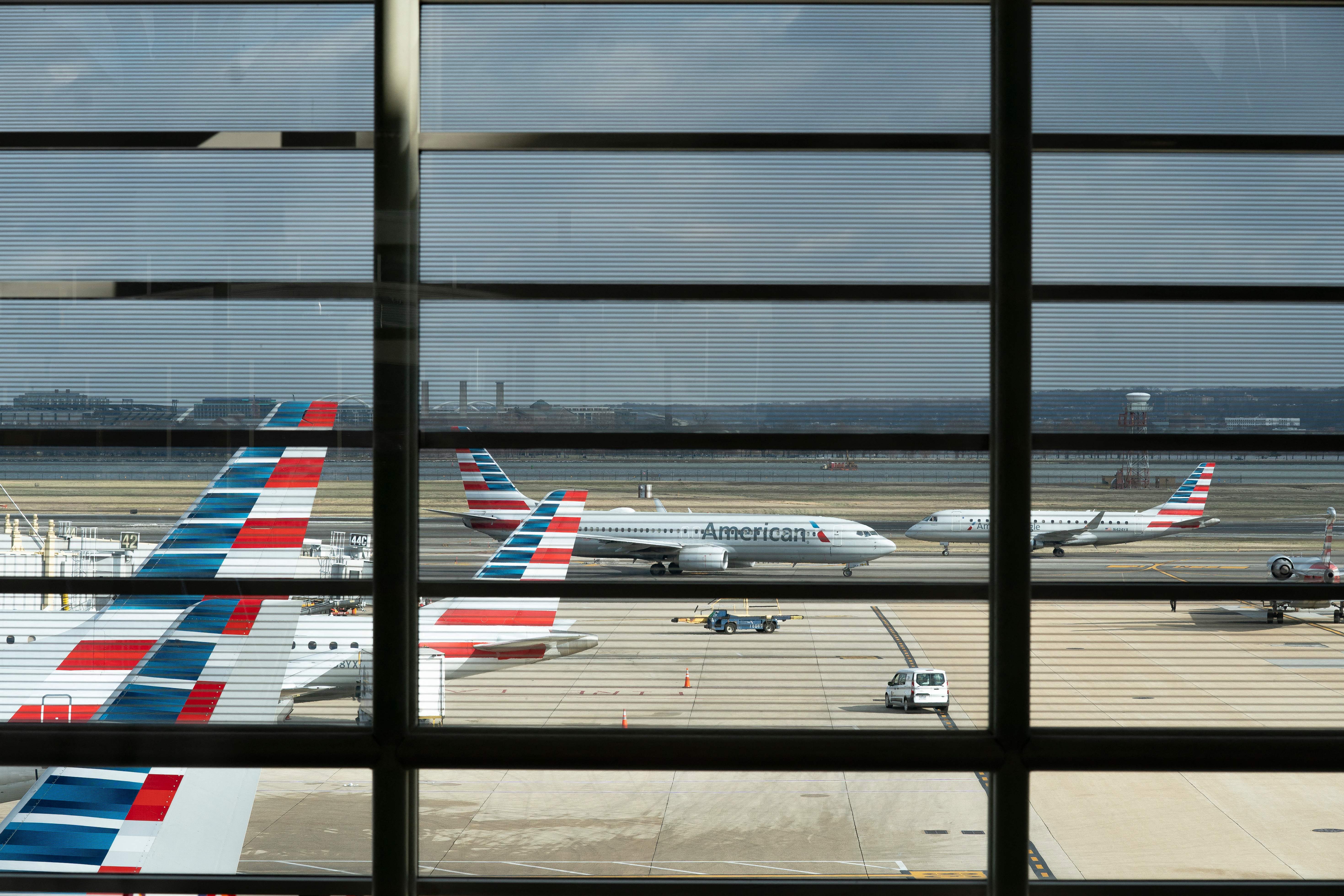 American Airlines planes sit at Ronald Reagan Washington National Airport in Arlington, Virginia, on 18 January
