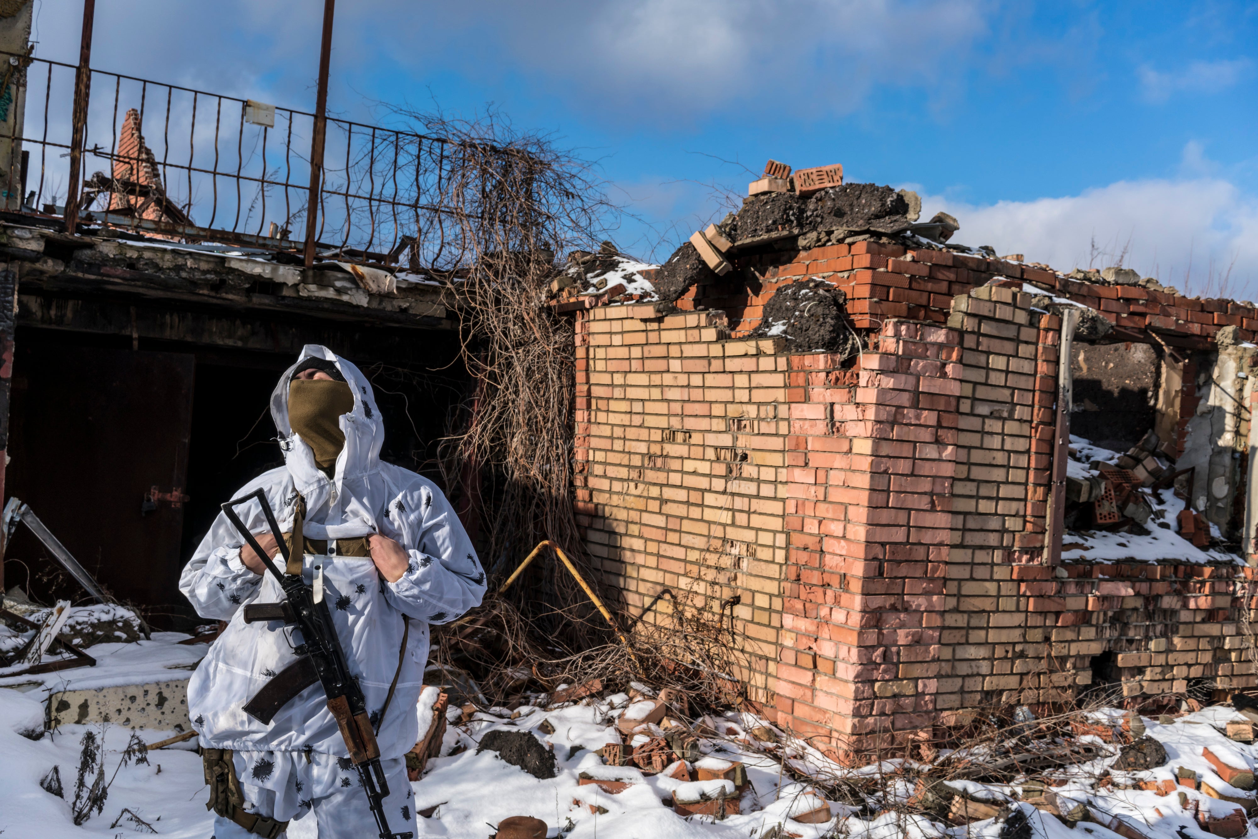 A Ukrainian soldier on the front line in Pisky, Ukraine, on 18 January 2022