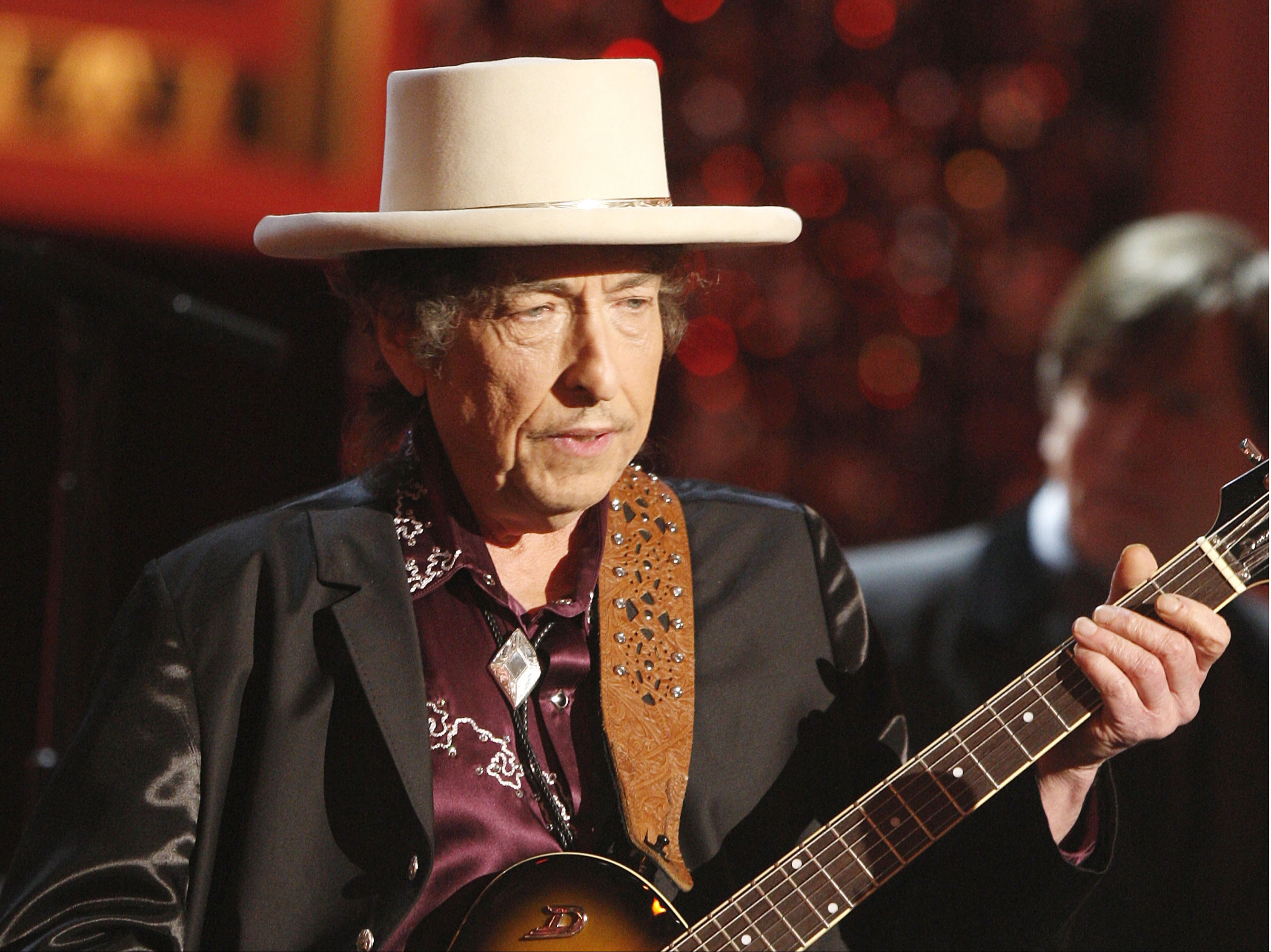 File: Bob Dylan performs onstage during the 37th AFI Life Achievement Award in 2009