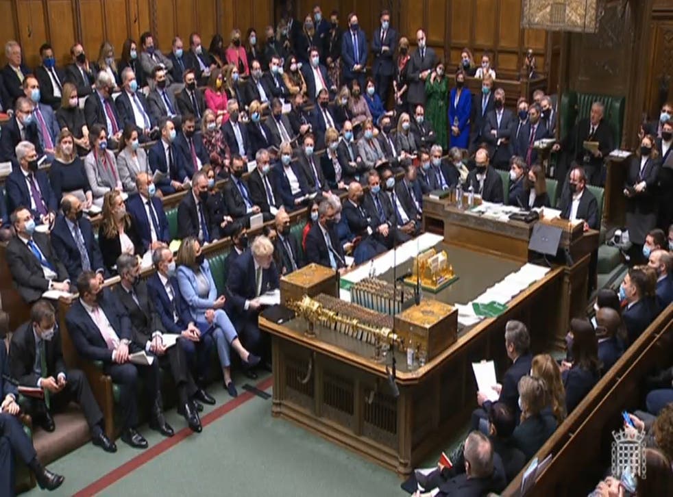 A view of the Conservative party benches as Prime Minister Boris Johnson stands to speak during Prime Minister’s Questions (House of Commons/PA)
