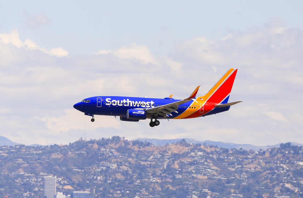A Southwest Boeing 737 lands at Los Angeles International Airport