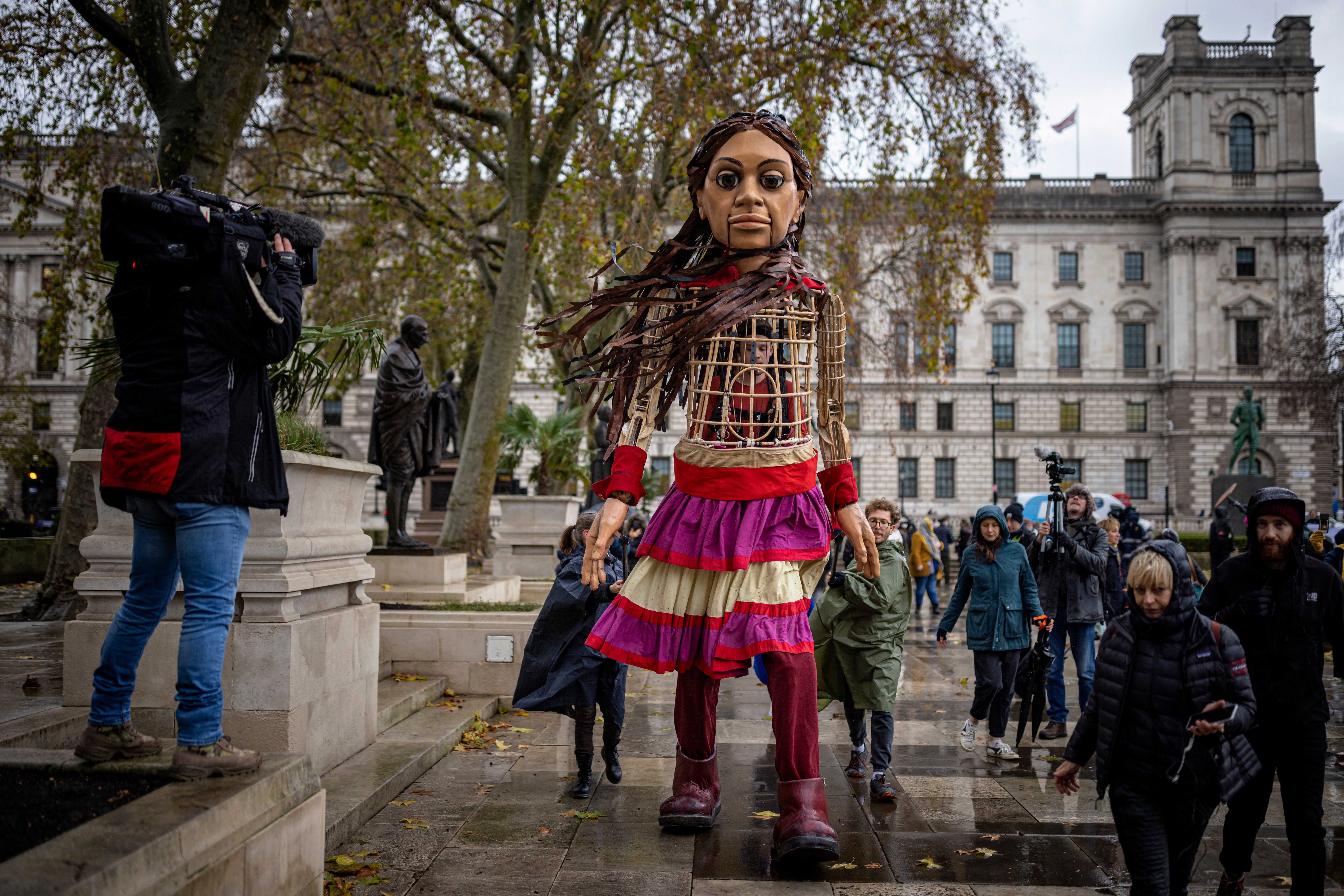 The groups behind Little Amal, the giant puppet symbolising a young Syrian refugee, bring her to Parliament Square as MPs debate the bill