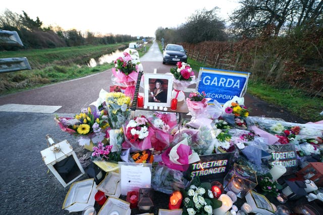 Floral tributes laid at the Grand Canal in Tullamore (Brian Lawless/PA)