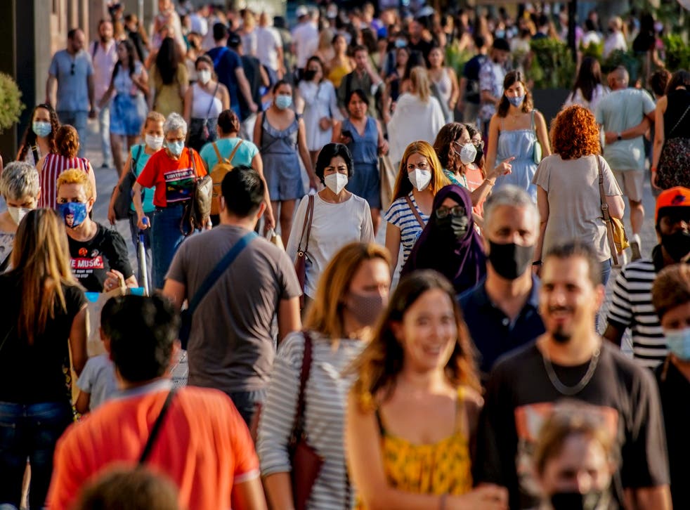 <p>People in Barcelona wearing face masks during the summer of 2021  </p>