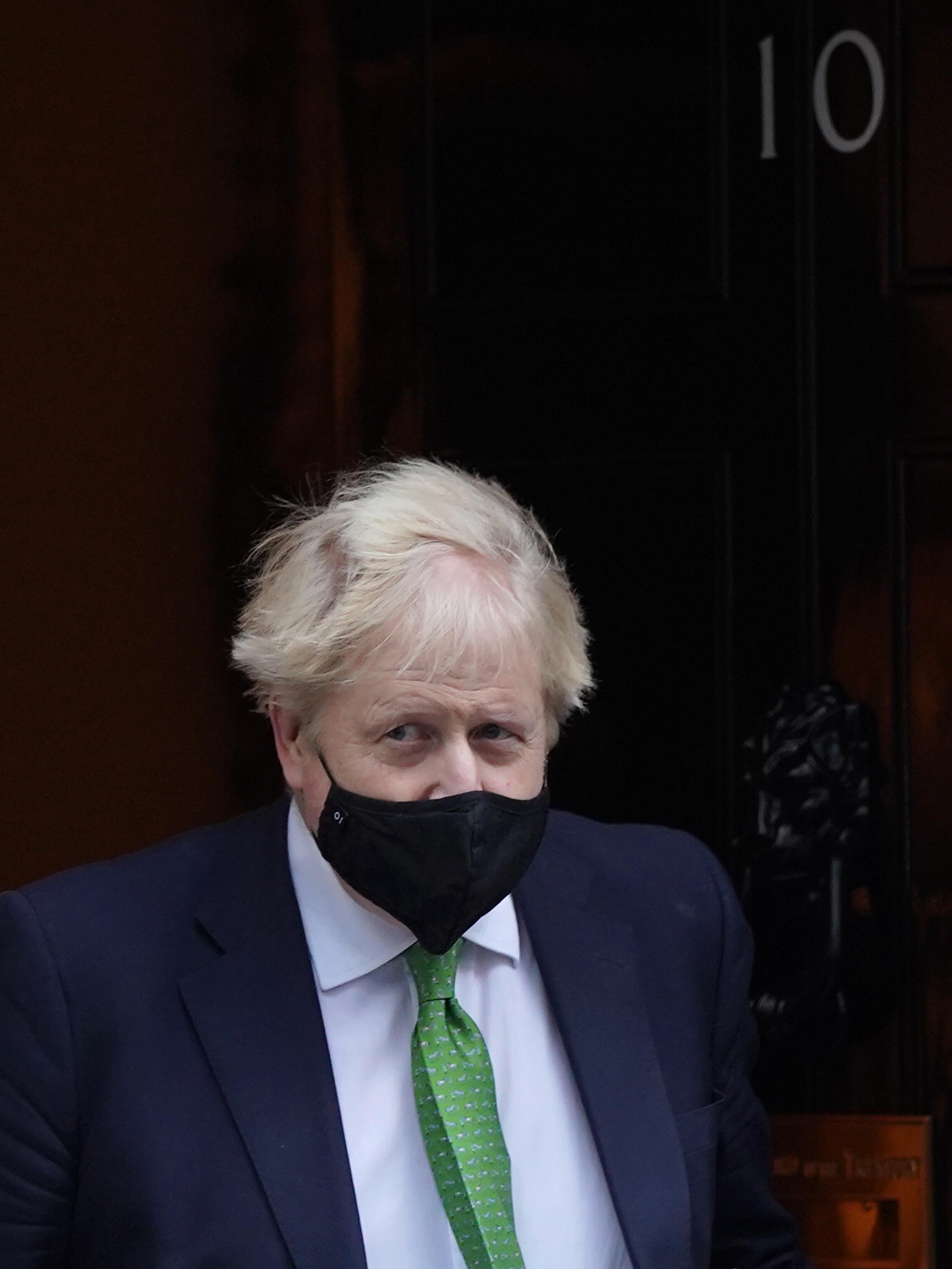 Prime Minister Boris Johnson leaves 10 Downing Street, London, to attend Prime Minister’s Questions at the Houses of Parliament. Picture date: Wednesday January 19, 2022.