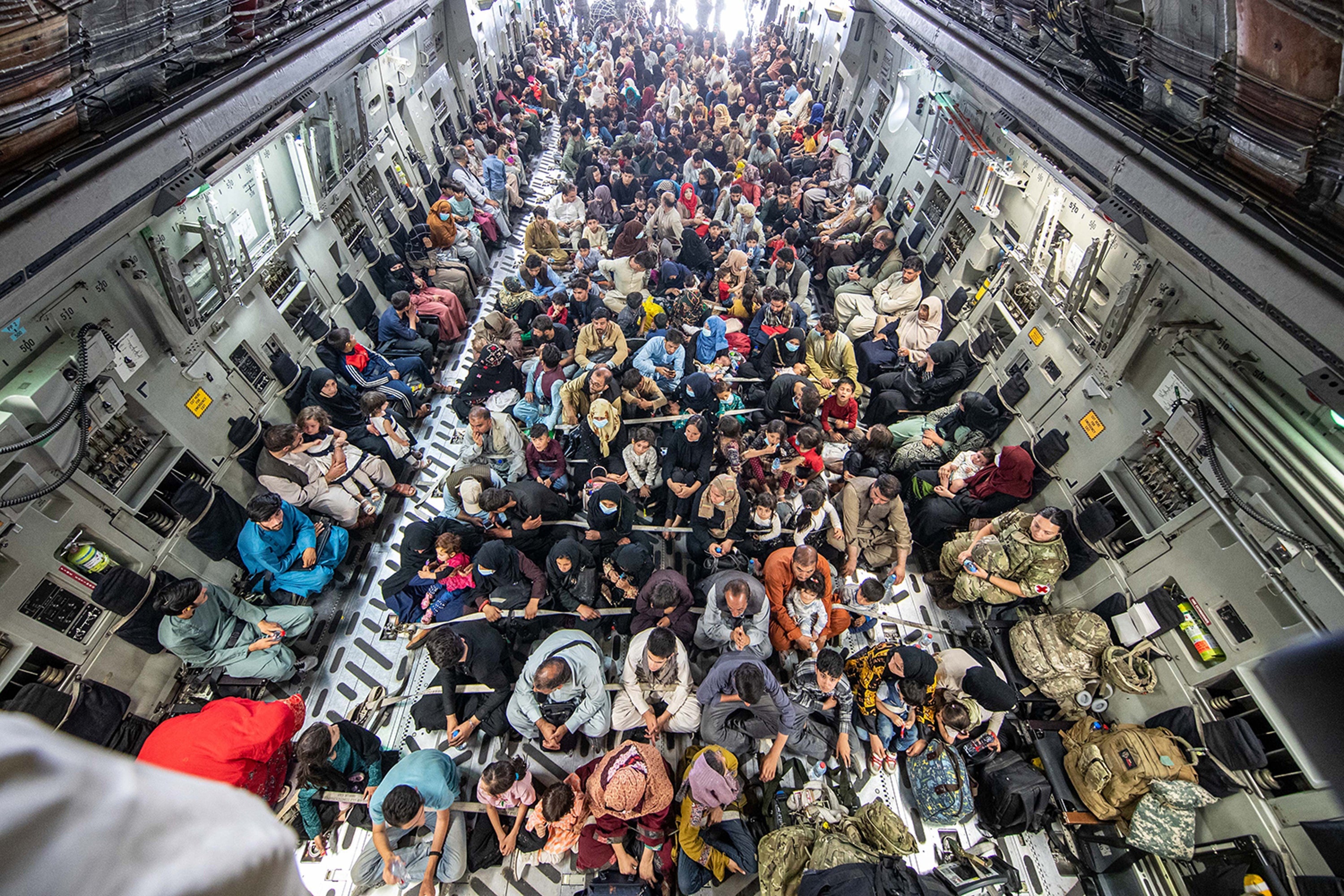 A full flight of 265 people supported by members of the UK Armed Forces on board an evacuation flight out of Kabul airport, Afghanistan (LPhot Ben Shread/MoD/PA)