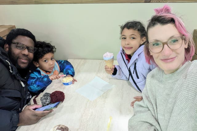 <p>Cristina Feretti (right) and her young children were unable to spend Christmas with her husband,  Christian Nkoyoh (left), after he was prevented from boarding a return flight from Italy</p>