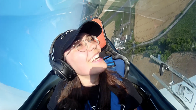 <p>Zara Rutherford flies above Slovakia in her Shark plane in July 2021 </p>