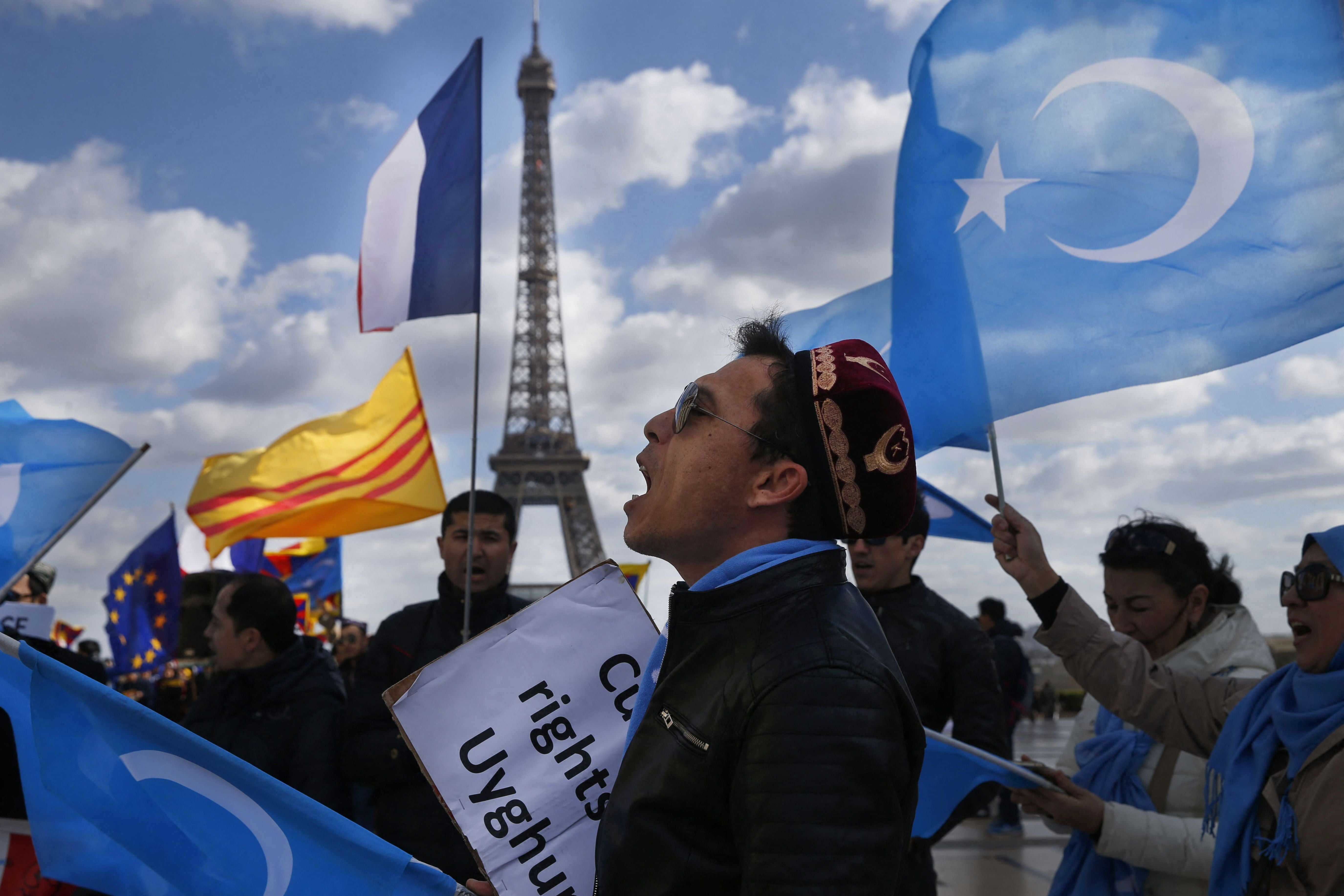 File photo: A protester of the French Uyghur Community shouts slogans during a demonstration over China’s human rights record in Paris, France, 25 March 2019