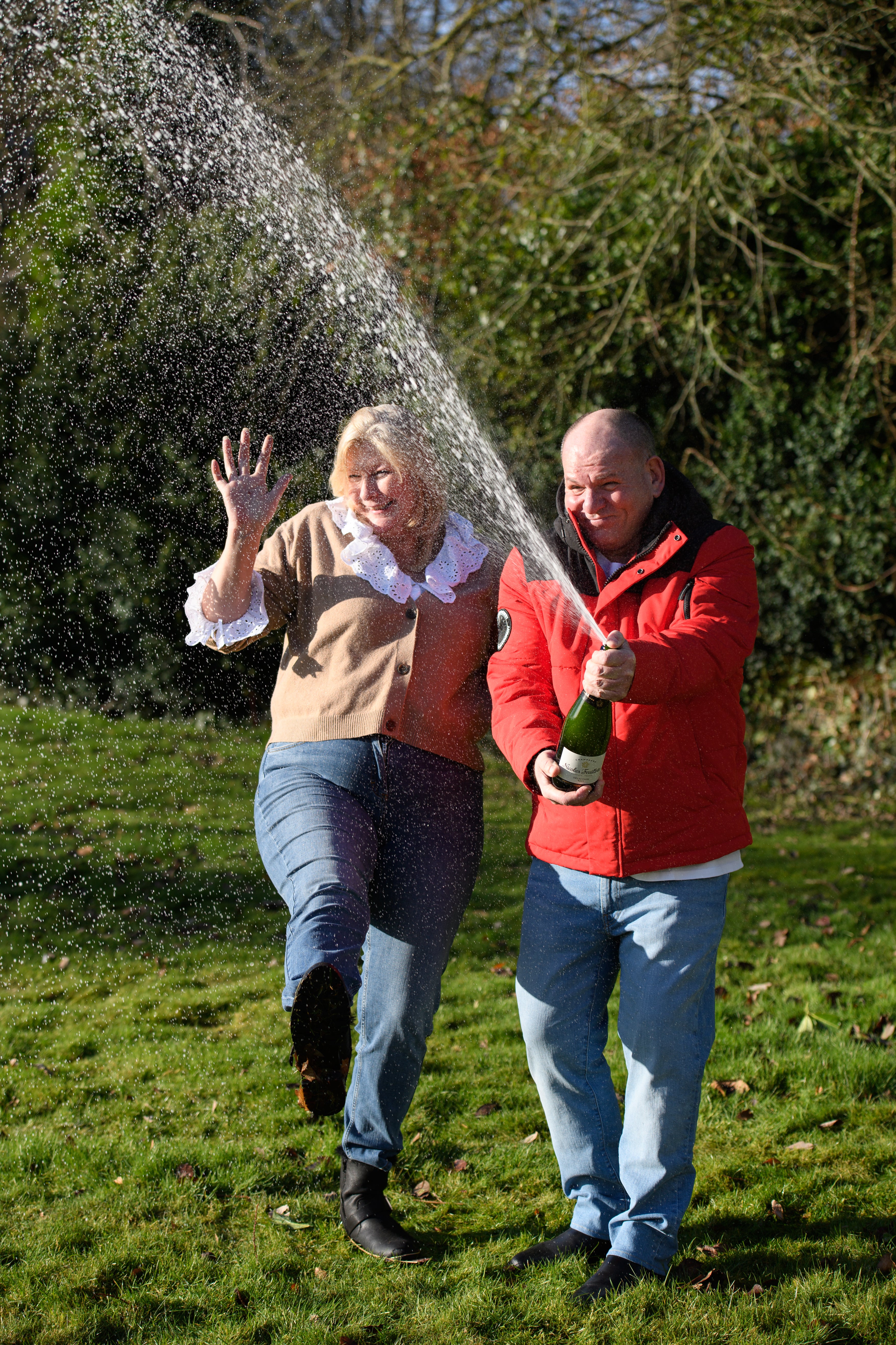 Ian Black, 61, and Sandra Black, 55, celebrate winning £2 million on a Lottery scratchcard (Oli Scarff/Camelot/PA)