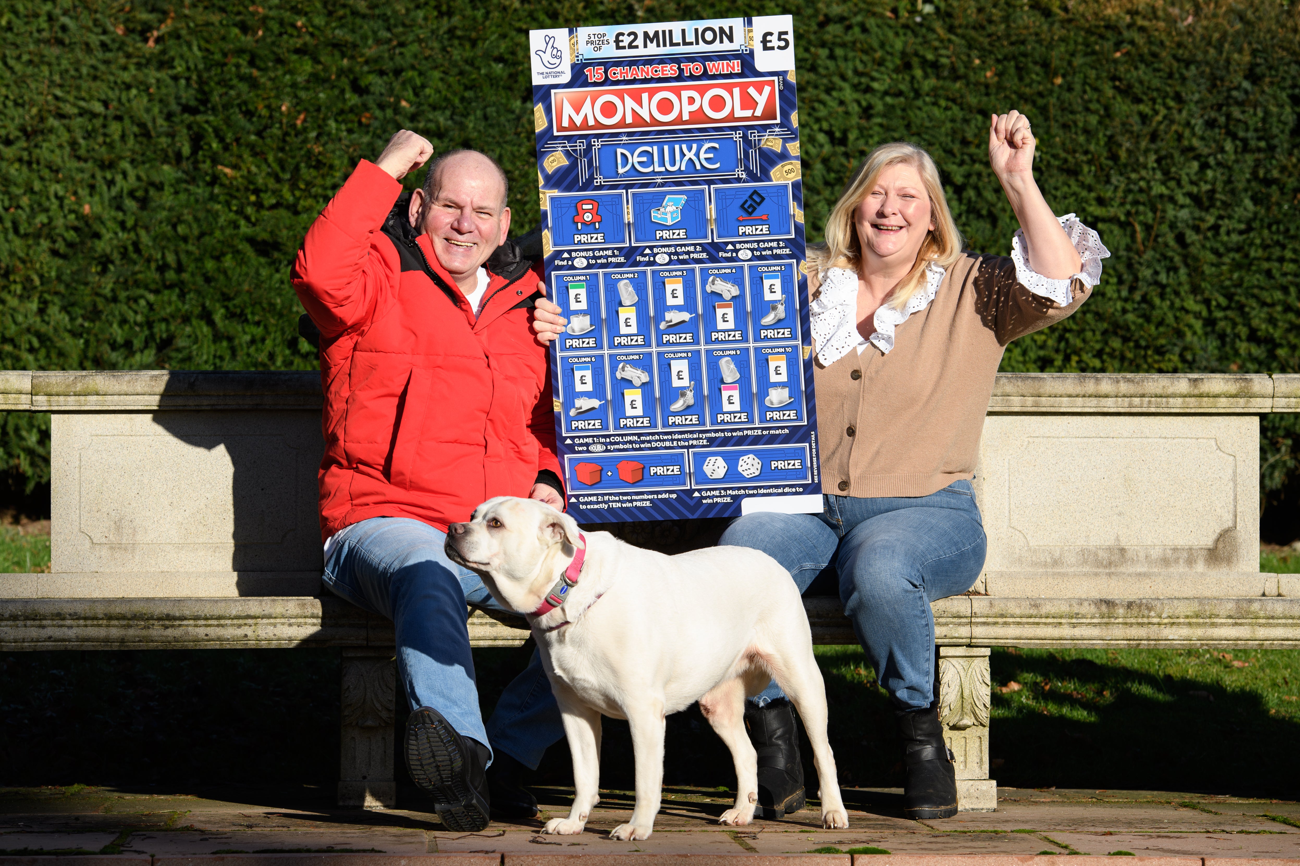 Ian and Sandra with their dog Meg. The couple say the first thing they do with their winnings is pay for Meg’s operation. Undated image from Oli Scarff/Camelot
