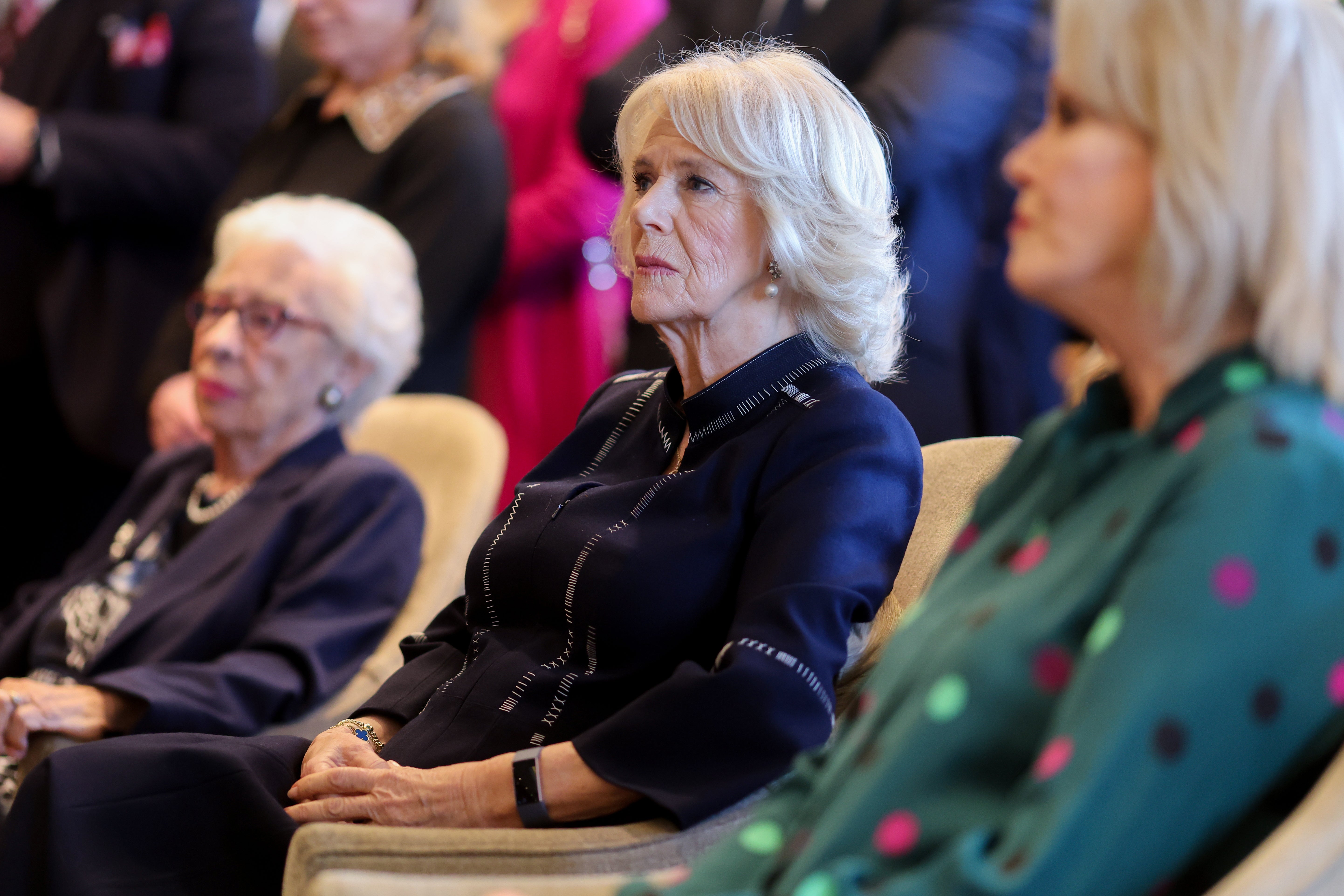 Eva Schloss, step-sister of Anne Frank; the Duchess of Cornwall; and Dame Joanna Lumley watch a performance during the event (Chris Jackson/PA)