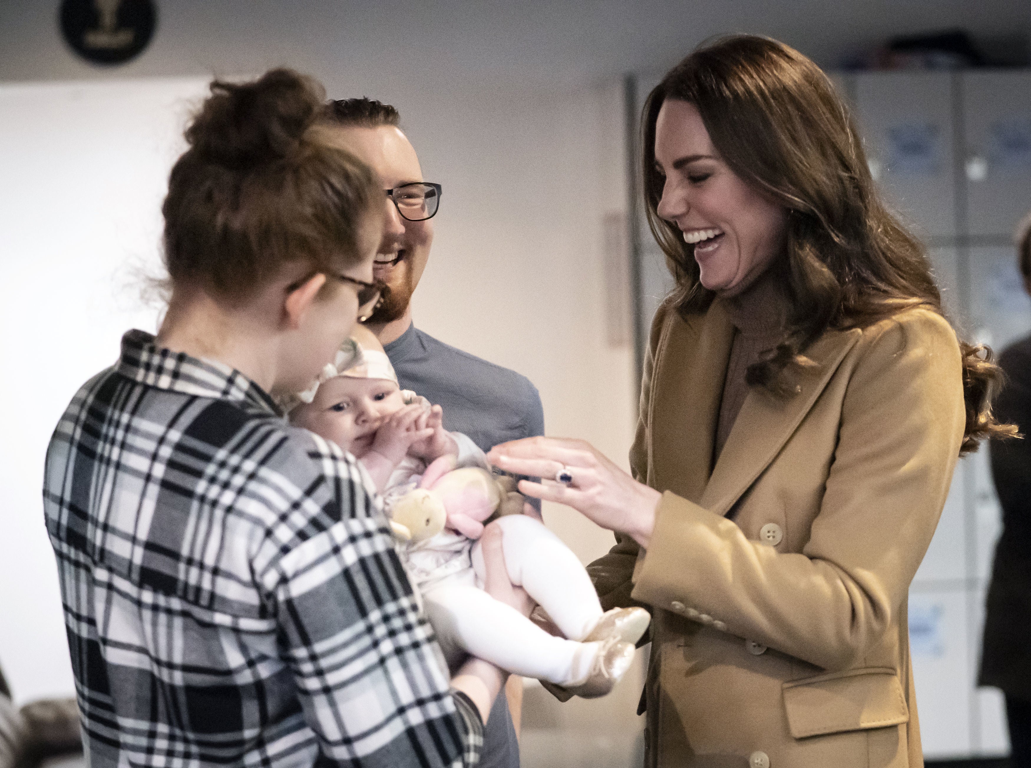 The Duchess of Cambridge meets Trudi and Alastair Barrie and their daughter Anastasia (Danny Lawson/PA)