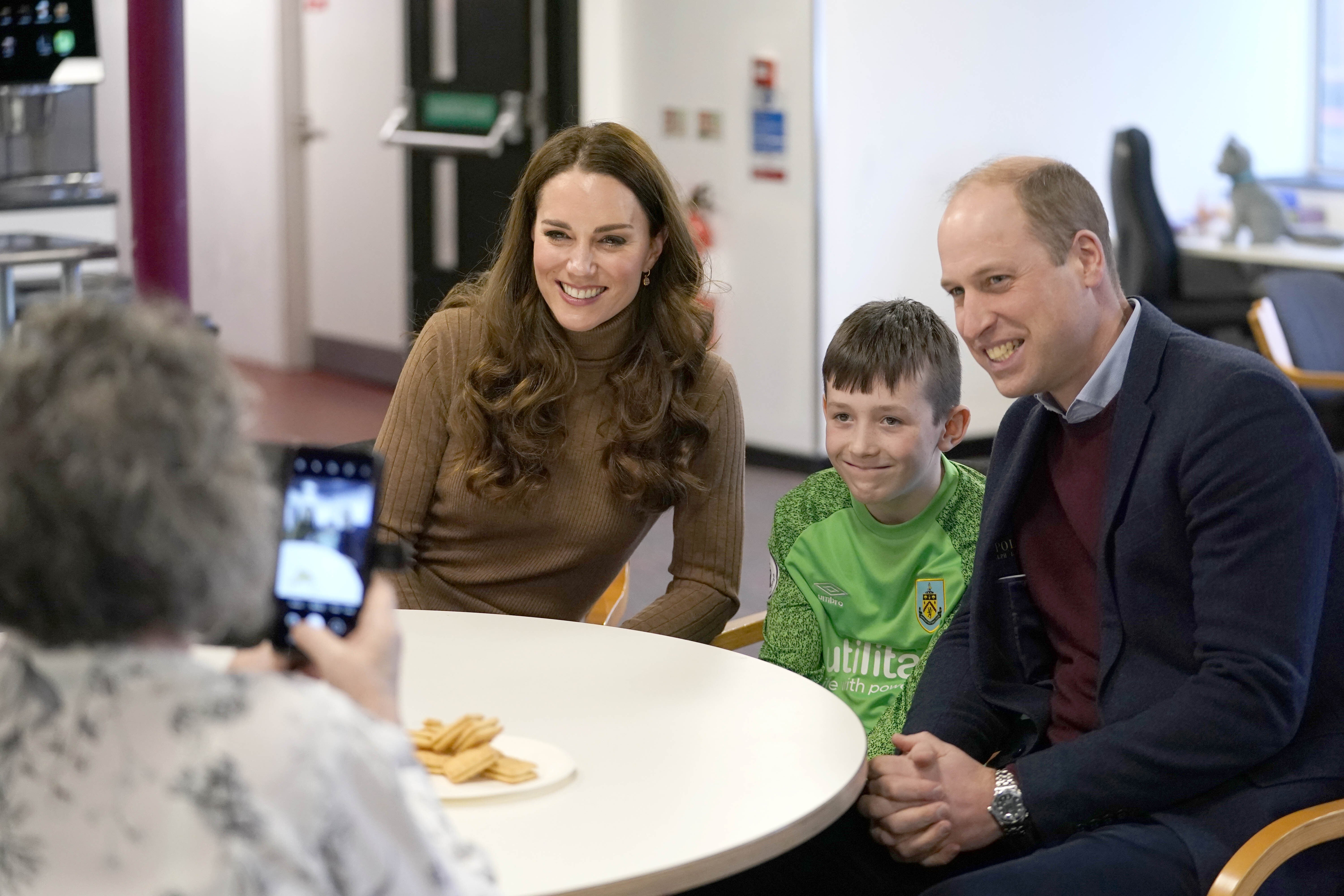 The Duke and Duchess of Cambridge meet Carole Ellis and her great grandson Deacon Glover (Danny Lawson/PA)