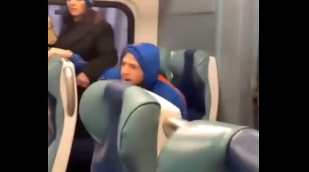 Pair charged with hate crimes for abusing woman on New York train after being caught in viral video