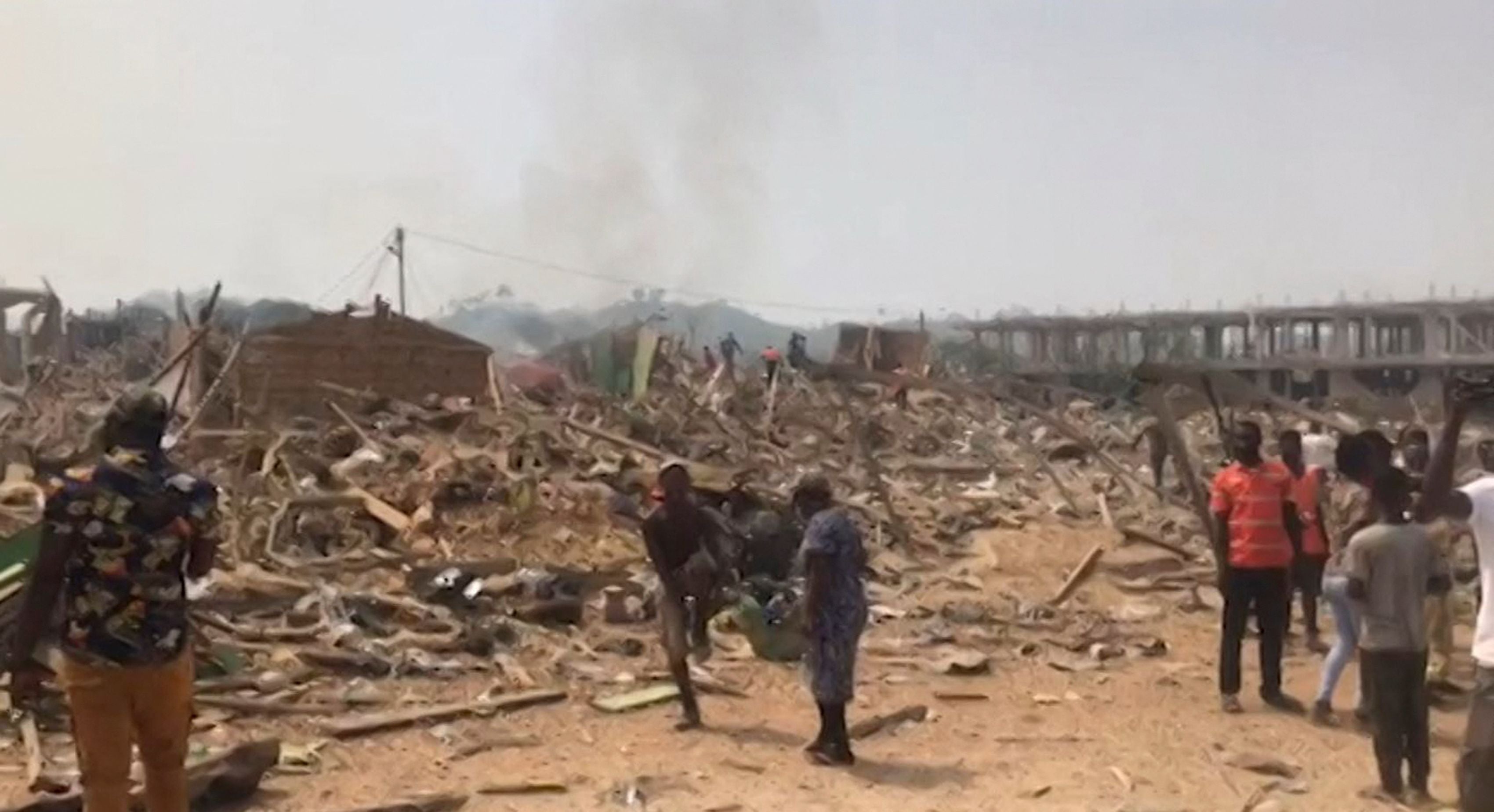 The aftermath of an explosion in the village of Apiate, which has killed at least 17 people