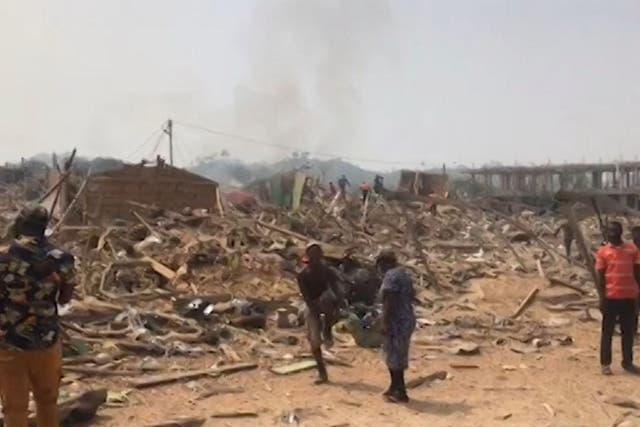 <p>The aftermath of an explosion in the village of Apiate, which has killed at least 17 people  </p>