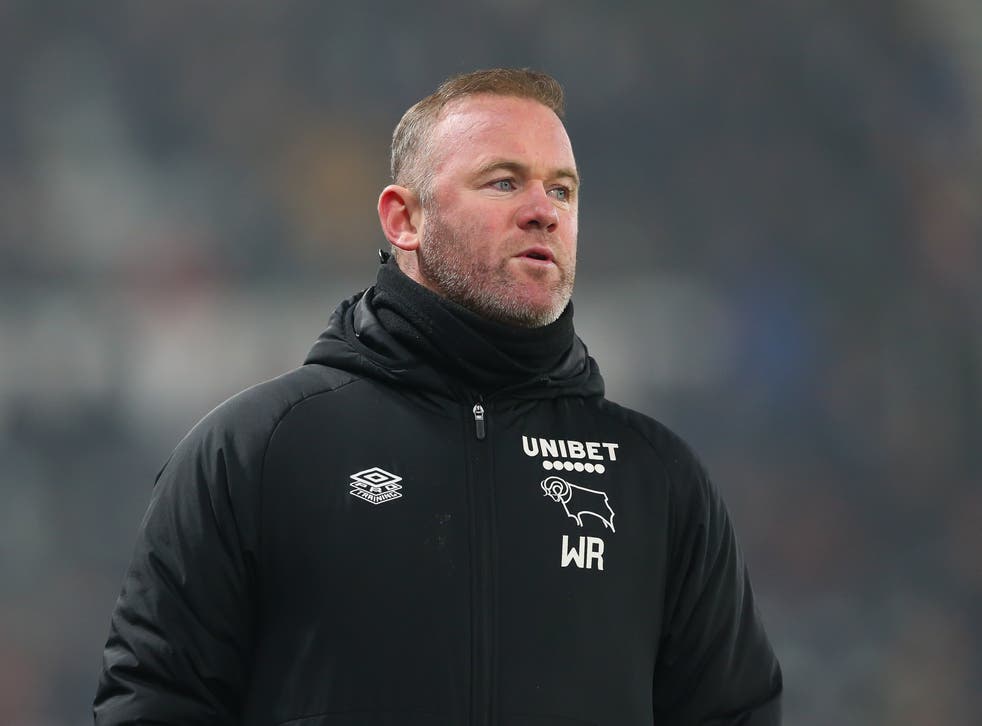 Wayne Rooney is flattered by speculation linking him with the vacant manager’s job at Everton but says his focus is on Derby (Barrington Coombs/PA)