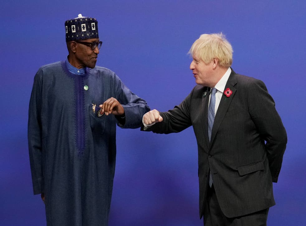 <p>British prime minister Boris Johnson with Nigerian president Muhammadu Buhari at Cop26 in Glasgow last year </p>